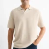 Knitted polo shirt - relaxed fit - textured light beige