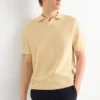Knitted polo shirt - relaxed fit - textured light yellow