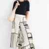 Cloth trousers - high waist - wide leg - patterned white / black