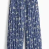 Floral - plissÃ© trousers - shiny blue
