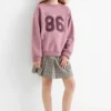 Pleated skirt - check black / beige