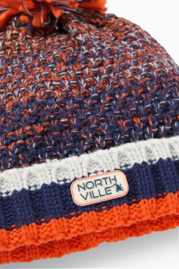 Pom-pom hat - patterned - textured orange