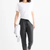 Jersey trousers - mid-rise waist - tapered fit - textured dark gray