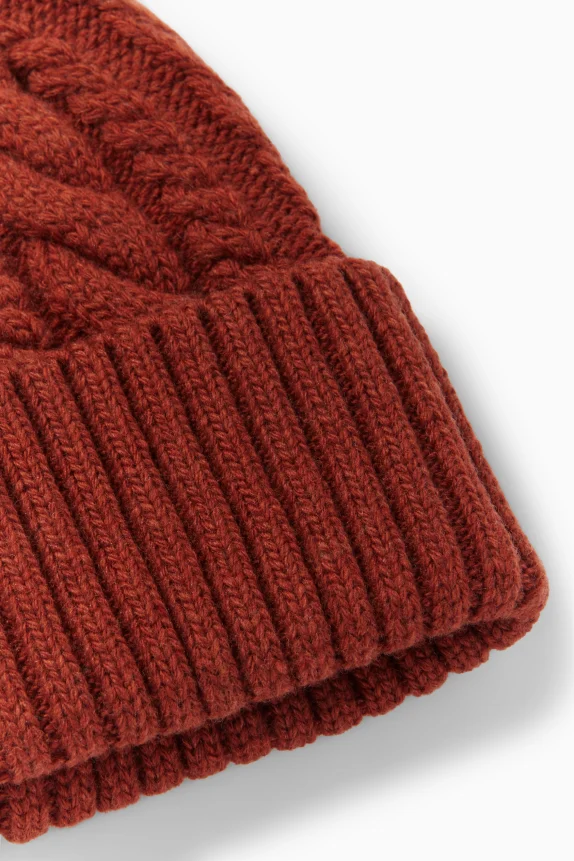Knitted hat - cable knit pattern rust