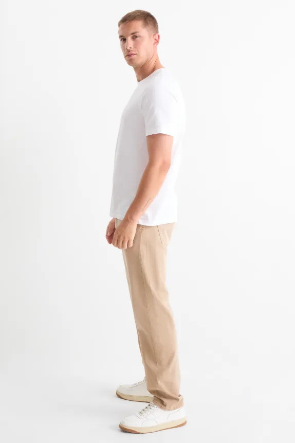 Regular jeansÂ with button fly light beige